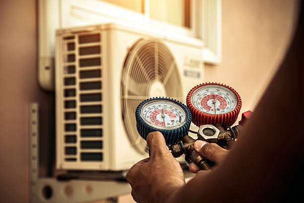 Professional Heat Pump Repair technician working in Cardale, PA